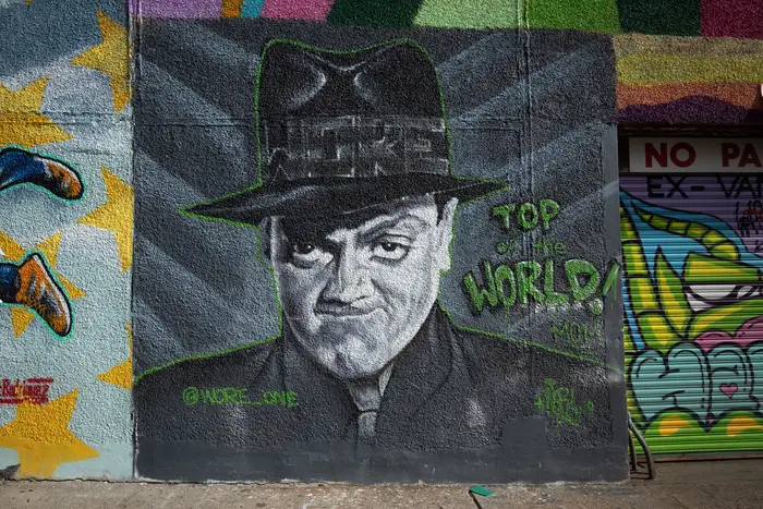 A photo of a Jimmy Cagney mural in Astoria